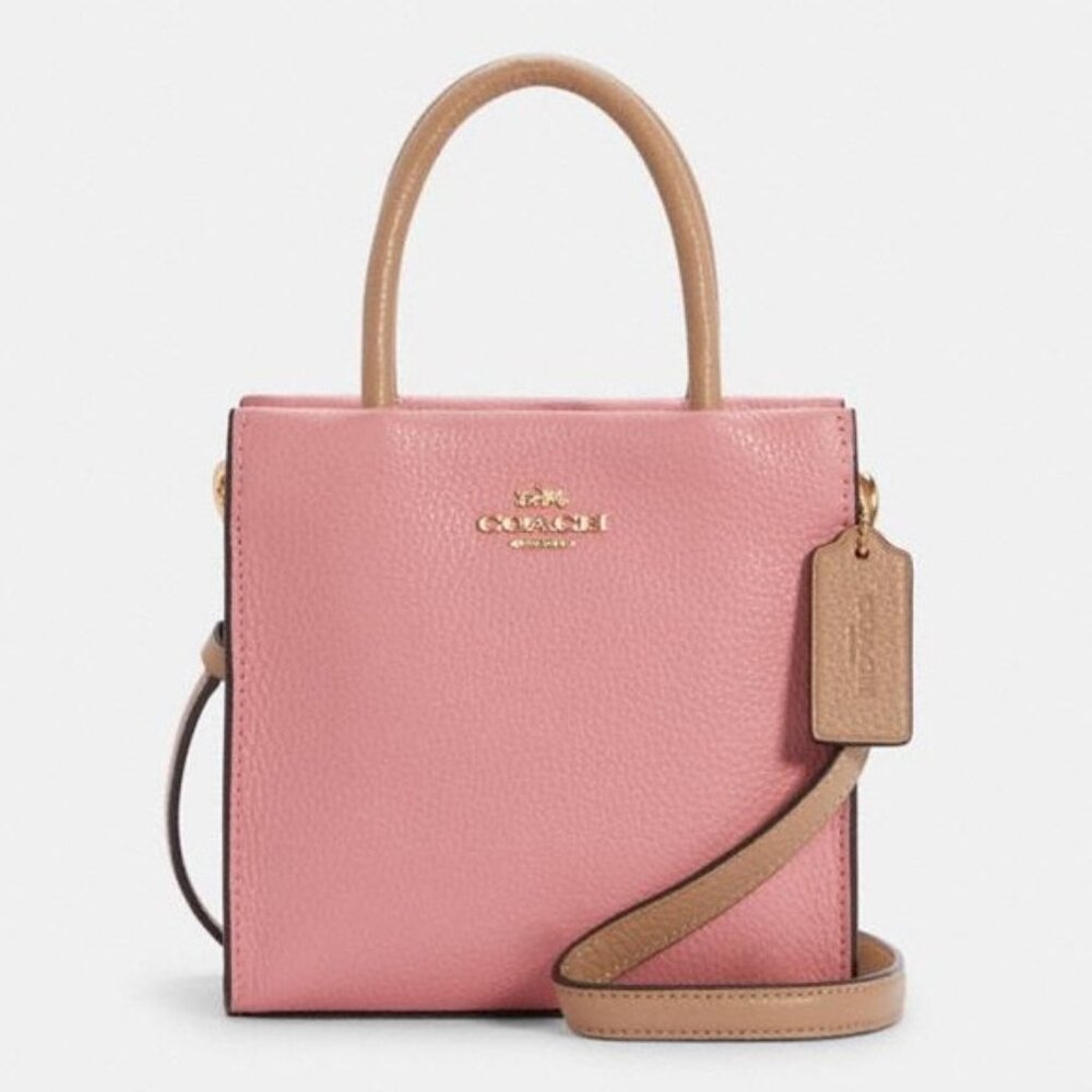 NWOT Coach Cally mini bag pink and vanilla cream color